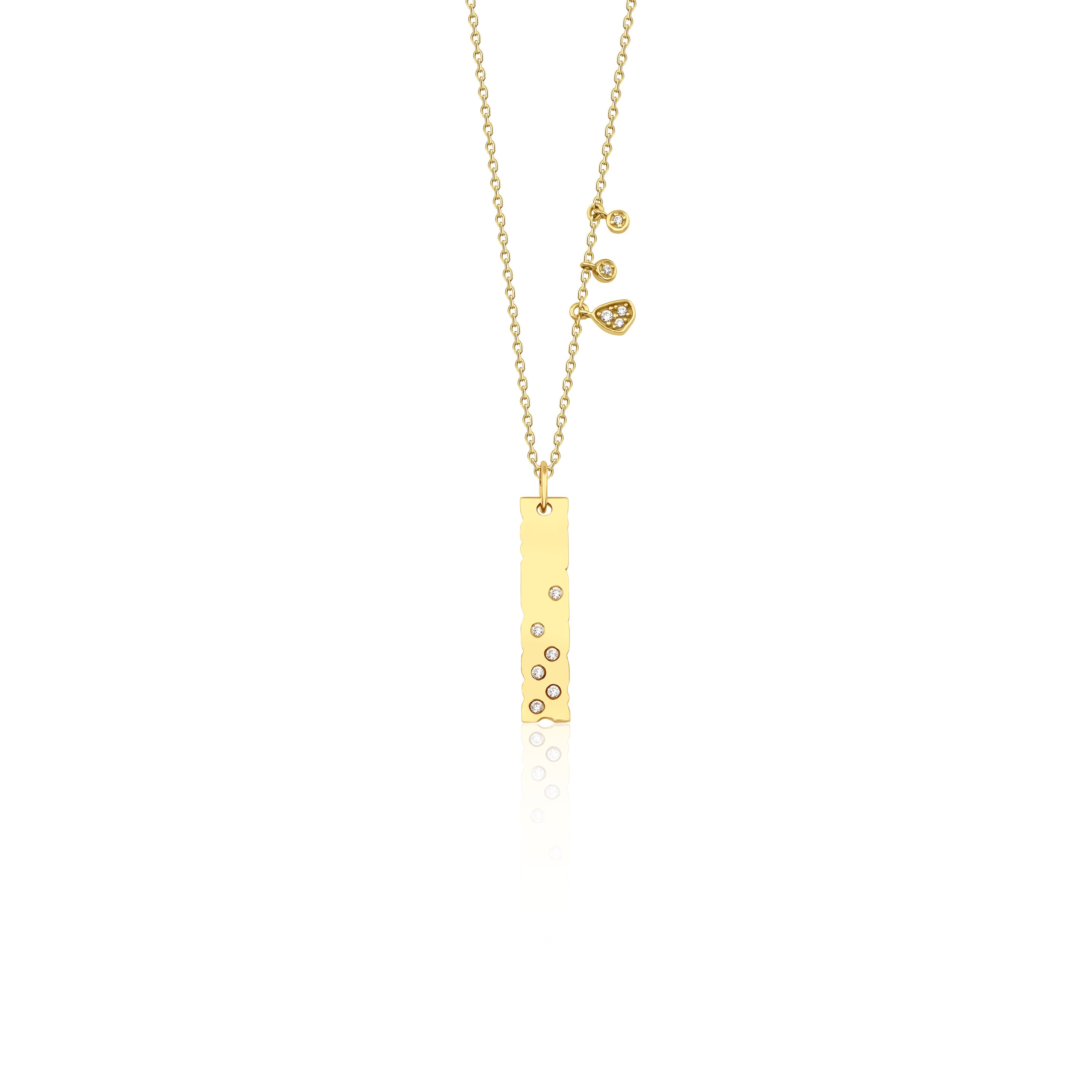 yellow gold bar charm necklace on white background