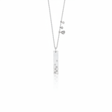 white gold bar charm necklace on white background