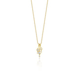 yellow gold cascade drop necklace on white background