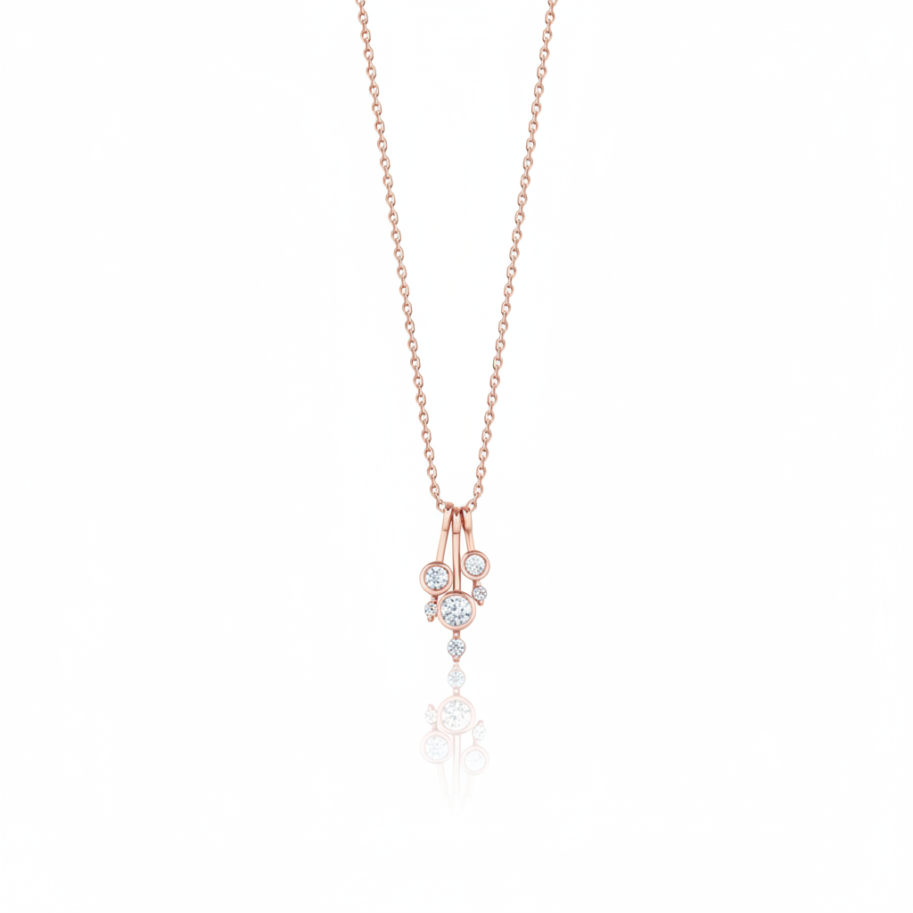 rose gold cascade drop necklace on white background