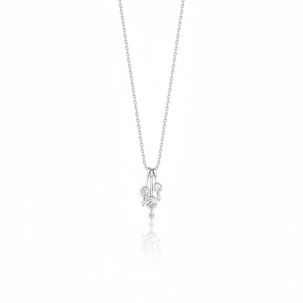 white gold cascade drop necklace on white background