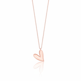 rose gold tilted heart pendant necklace on white background