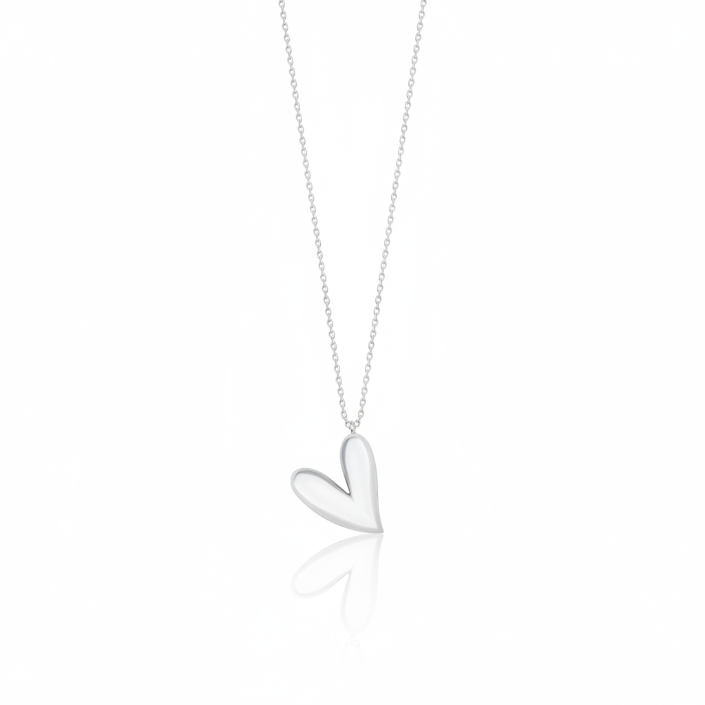 white gold tilted heart pendant necklace on white background