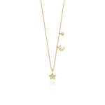 yellow gold crescent moon and star pendant necklace on white background