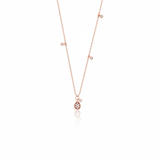 rose gold teardrop pendant necklace on white background