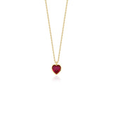 yellow gold red heart pendant necklace on white background