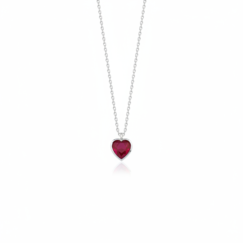 white gold red heart pendant necklace on white background