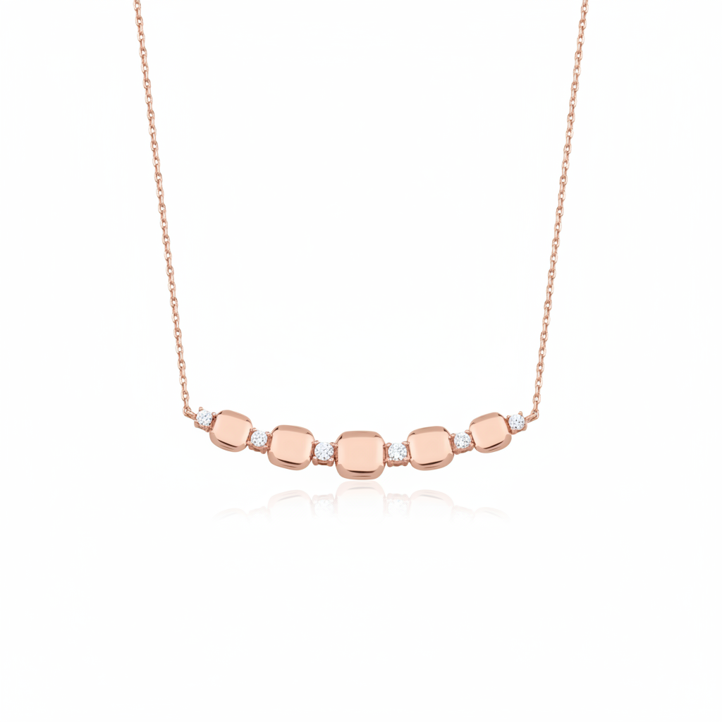 rose gold cushion station necklace on white background