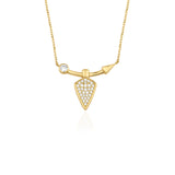yellow gold arrowhead pendant necklace on white background