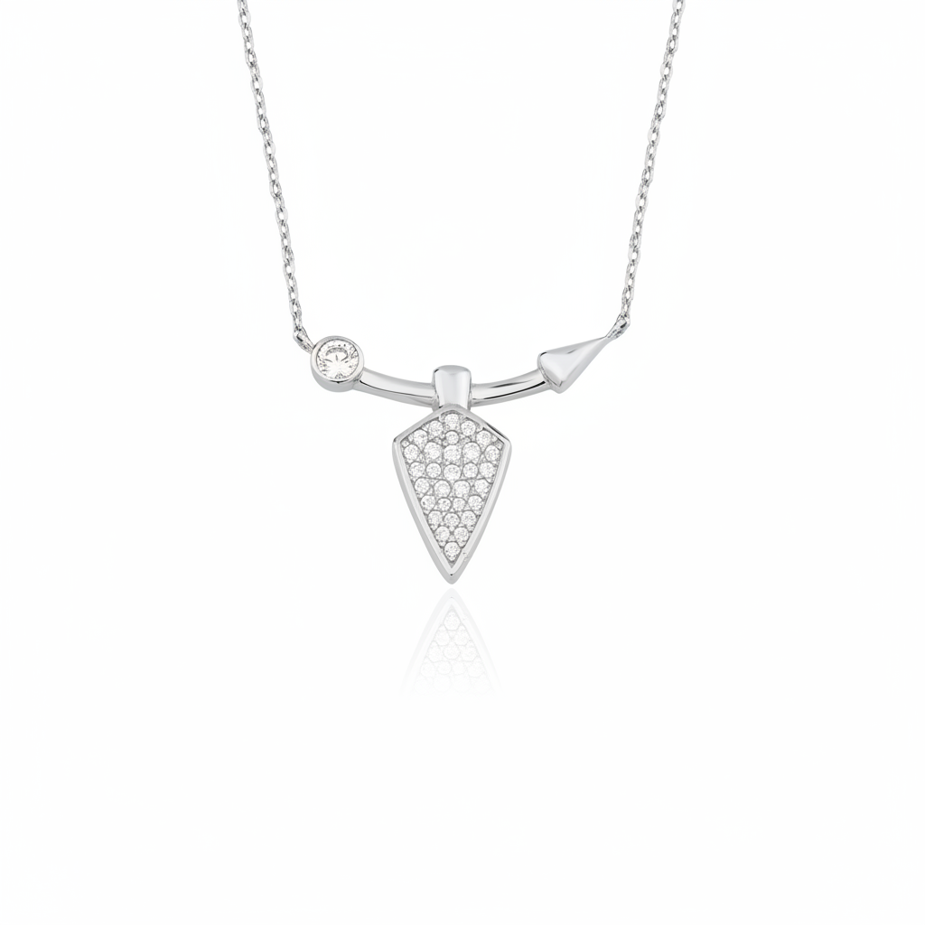 white gold arrowhead pendant necklace on white background
