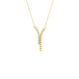 yellow gold dual strand Y-necklace on white background