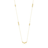 yellow gold square station necklace on white background