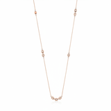rose gold square station necklace on white background