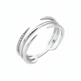 white gold claw wrap ring on white background