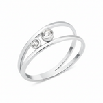 white gold open double-band ring with two bezel-set clear stones on white background