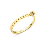 yellow gold beaded ring with a round cluster of White CZ stones on white background