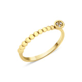 yellow gold beaded ring with a round cluster of White CZ stones on white background