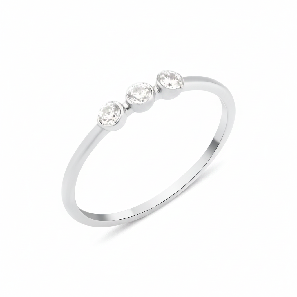 white gold slim ring with three bezel-set White CZ stones in a row on white background