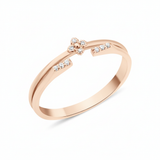 rose gold open ring with a four-petal blossom motif and pave White CZ stones on white background