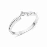 white gold open ring with a four-petal blossom motif and pave White CZ stones on white background
