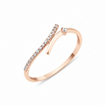 rose gold open wrap ring with a diagonal pave bar and a single round stone on white background
