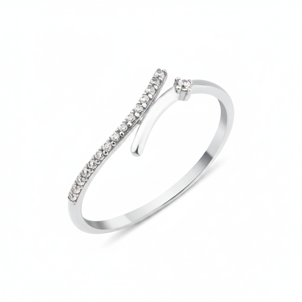 white gold open wrap ring with a diagonal pave bar and a single round stone on white background