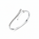 white gold open wrap ring with a diagonal pave bar and a single round stone on white background