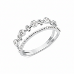 white gold double-band ring with a beaded strand, bezel-set stones, and polished gold spheres on white background