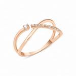 rose gold open crossover ring with a paved arch and a single solitaire stone on white background