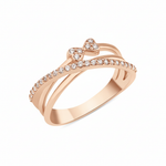 rose gold crossover ring with a pave strand and twin heart motifs set with clear stones on white background