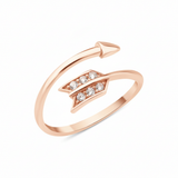 rose gold arrow-shaped open ring with a pave chevron fletching on white background