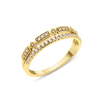 yellow gold double-row ring with geometric stone frames and a pave band on white background