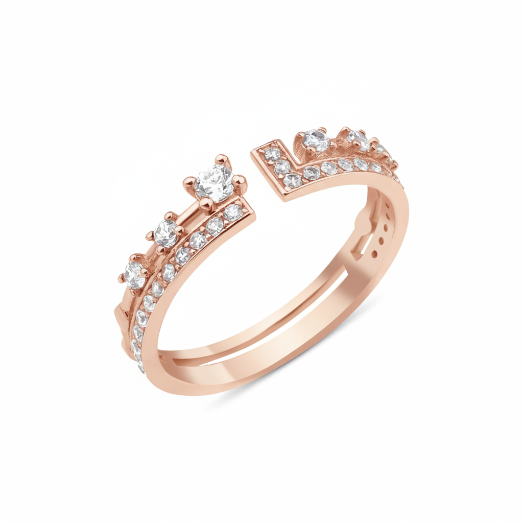 rose gold open ring with an elevated stone and a geometric pave crown on white background