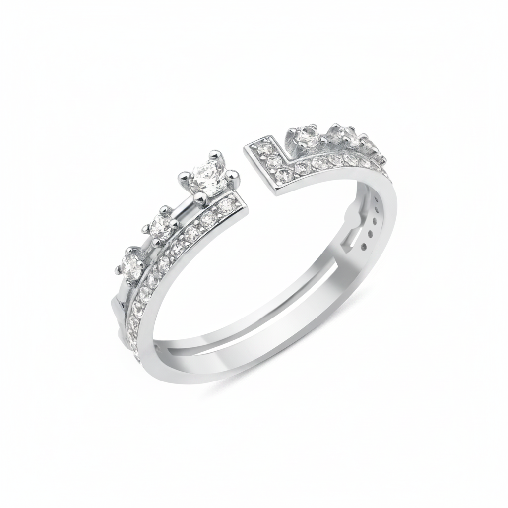 white gold open ring with an elevated stone and a geometric pave crown on white background