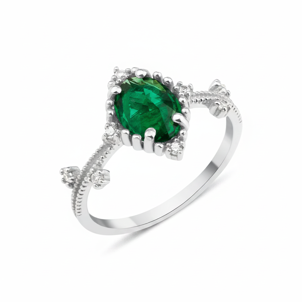 white gold ring with an oval green stone and White CZ accents on a beaded band on white background