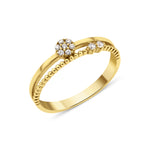 yellow gold dual-band ring with a floral cluster of White CZ stones on white background