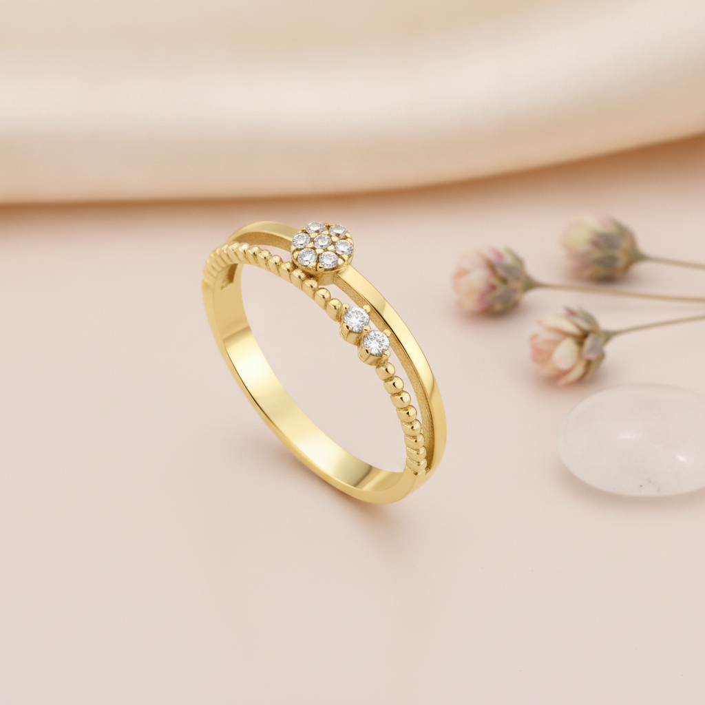 dual-band gold ring with a floral cluster of White CZ stones, styled with dried flowers on a cream background