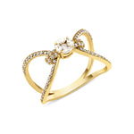 yellow gold open bow-shaped ring with pave loops and a marquise-cut stone cluster on white background
