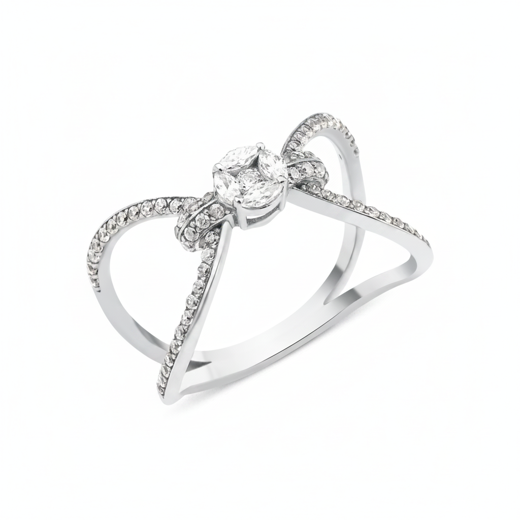 white gold open bow-shaped ring with pave loops and a marquise-cut stone cluster on white background