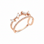 rose gold open double-band ring with pave stones and marquise-cut accents on white background