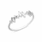 white gold ring with marquise-cut and round stones on a textured geometric band on white background