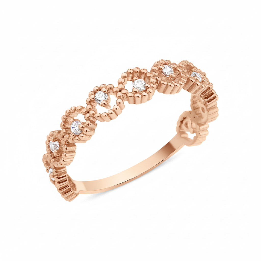 rose gold ring with linked beaded crowns and White CZ stones on white background