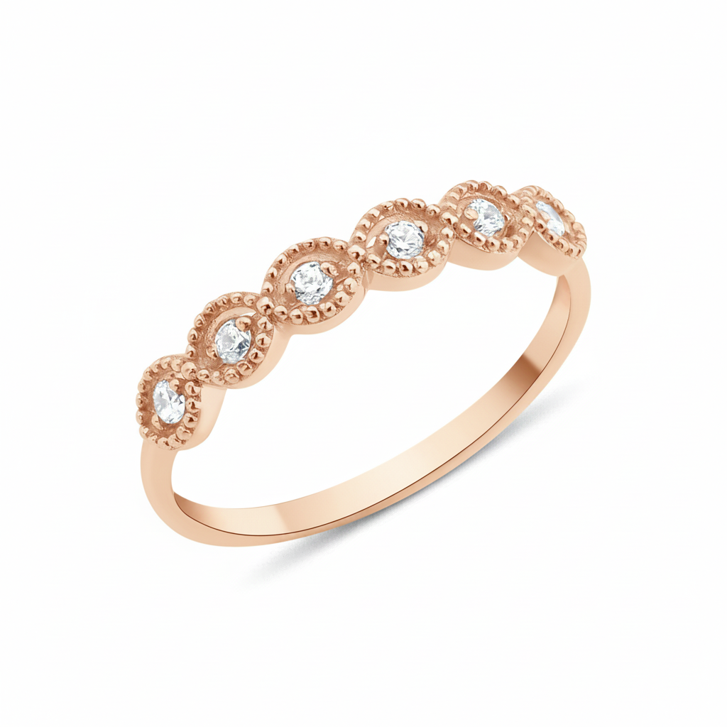 rose gold ring with six round stones in milgrain bezels on white background