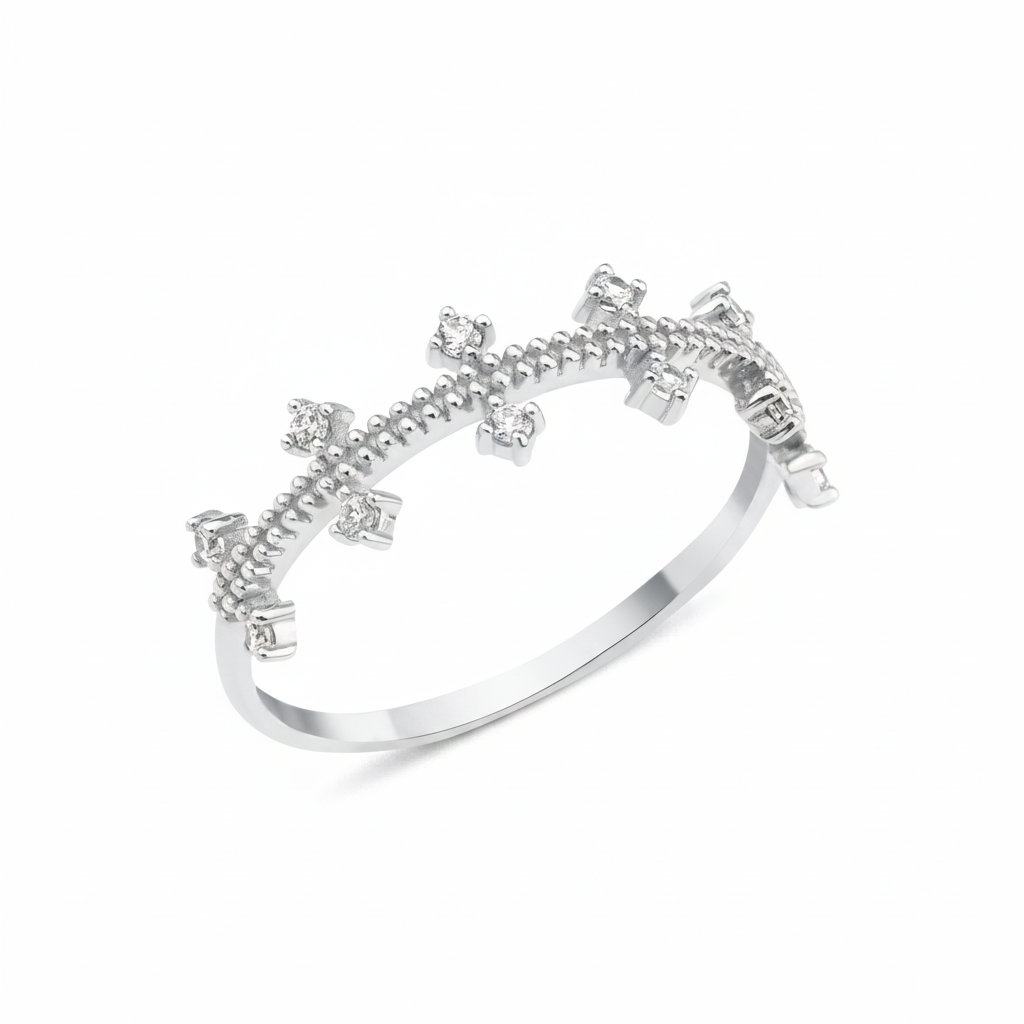 white gold ring with staggered clear prong-set stones on a beaded band on white background