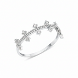 white gold ring with staggered clear prong-set stones on a beaded band on white background