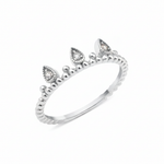 white gold ring with three teardrop crown crests set with clear stones on white background