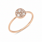 rose gold ring with a circular disc set with clustered White CZ stones on white background