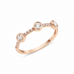 rose gold twin stone ring on white background