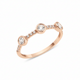 rose gold twin stone ring on white background