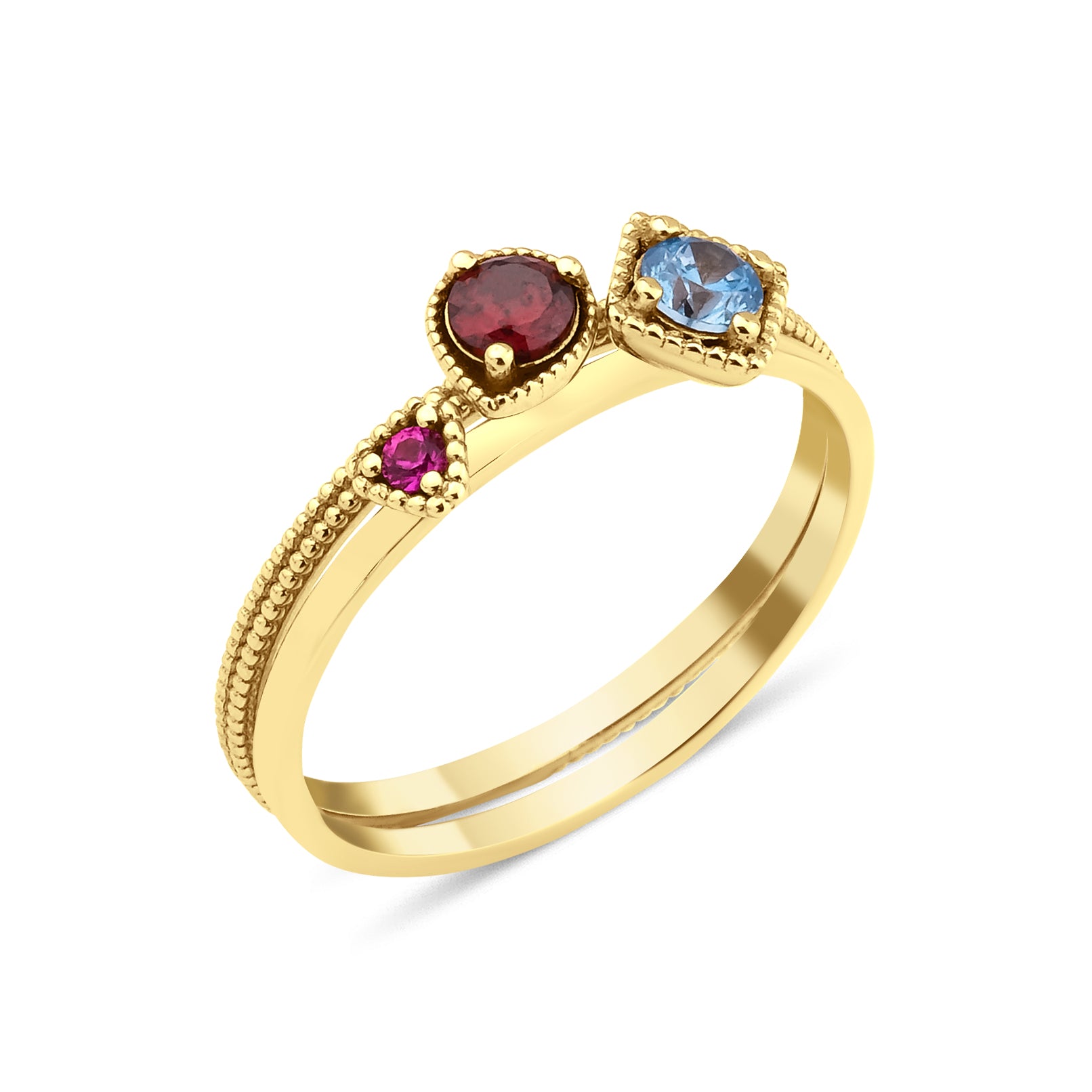 yellow gold trio gem ring on white background